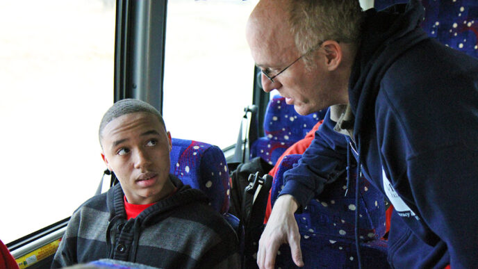 Brian Brady talks with a Mikva Challenge student|Brian Brady talks with a Mikva Challenge student