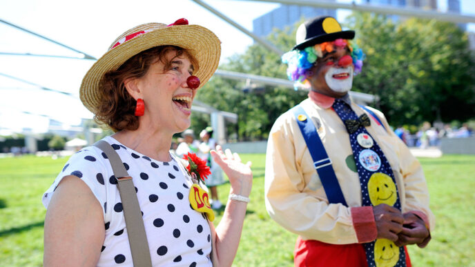 Karen Hoyer and another member of her clown troupe at Pritzker Pavilion in Millennium Park|