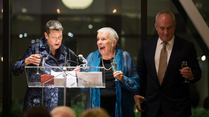 |Sarah Mirkin holds the Award at the