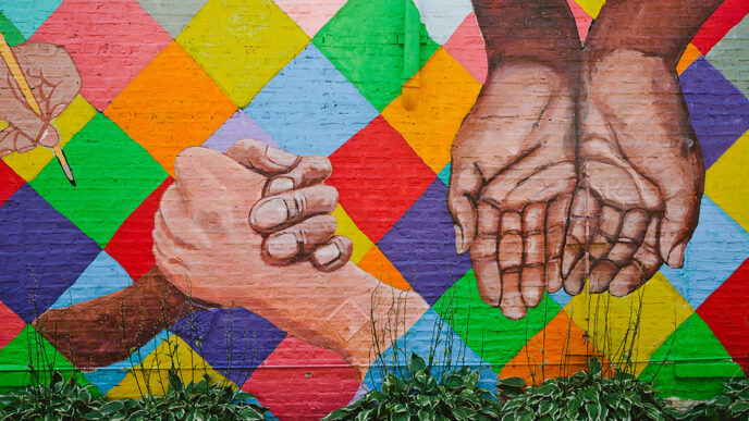 Mural depicting hands of many colors