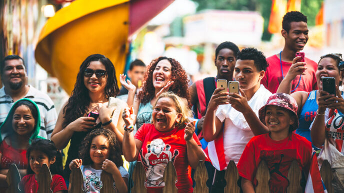 A crowd of people smiling