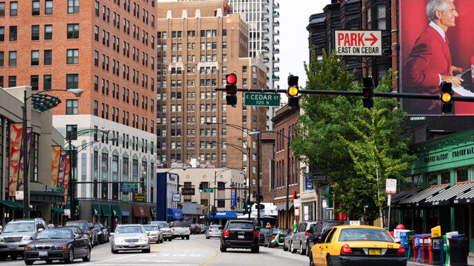 Street scene in Chicago's Gold Coast neighborhood|Dr. Raphael Bostic speaking at the How Place Matters summit