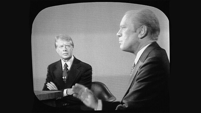 Television screen showing Jimmy Carter and Gerald Ford at podiums during their 1946 presidential debate|Portrait of Charles Benton