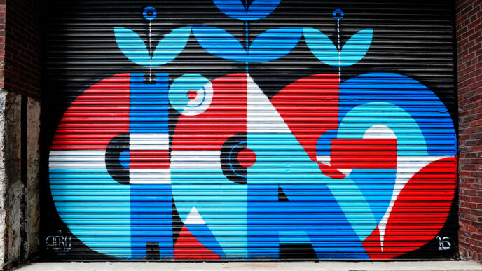 A mural reading Chicago painted on an industrial overhead door