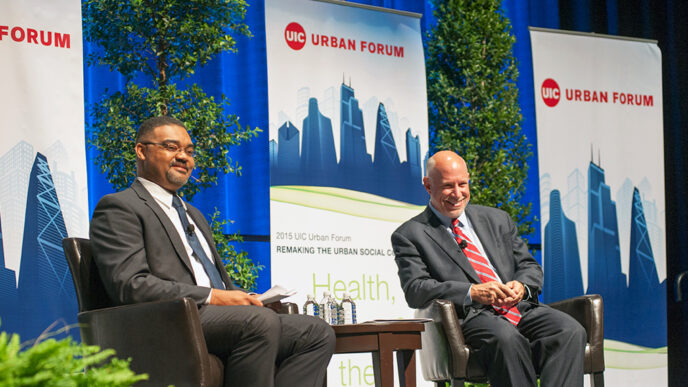 Joe Hoereth of IPCE and Terry Mazany of The Chicago Community Trust on stage at the UIC Urban Forum