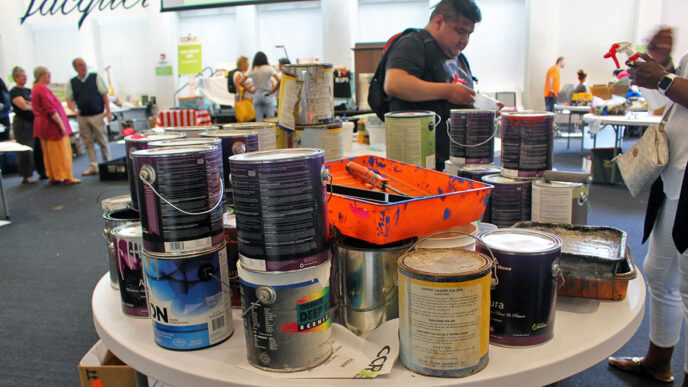A table stacked with paint