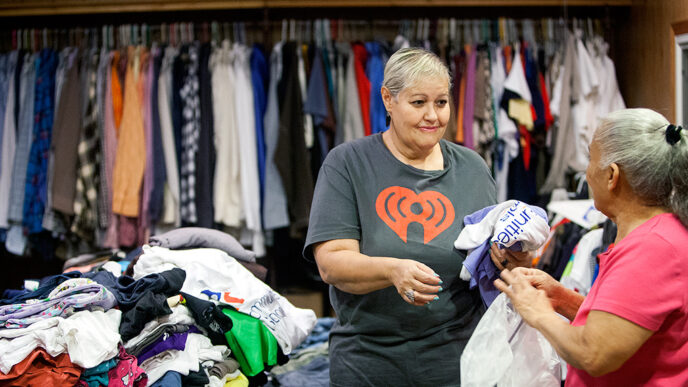 In a room filled with clothing